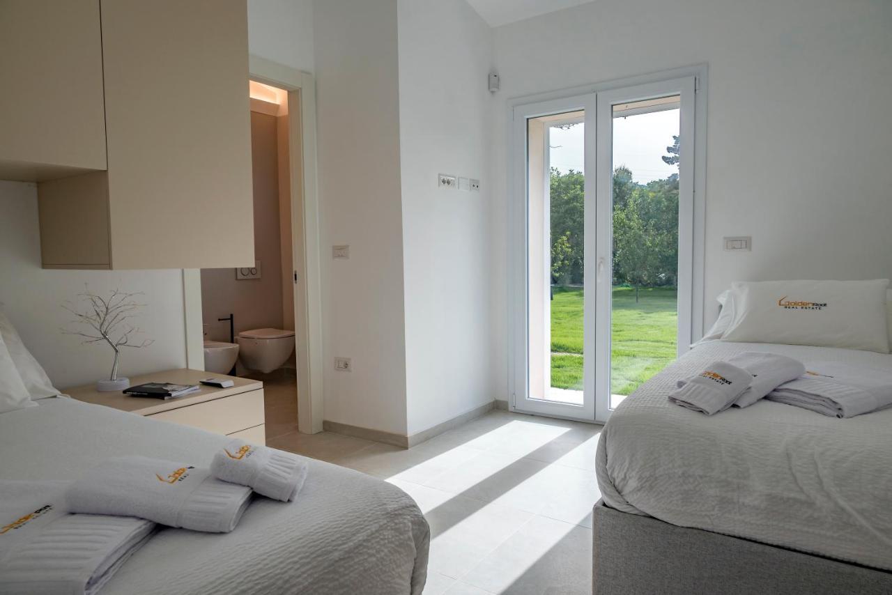 Villa Golden Root Real Estate Сан-Теодоро Экстерьер фото